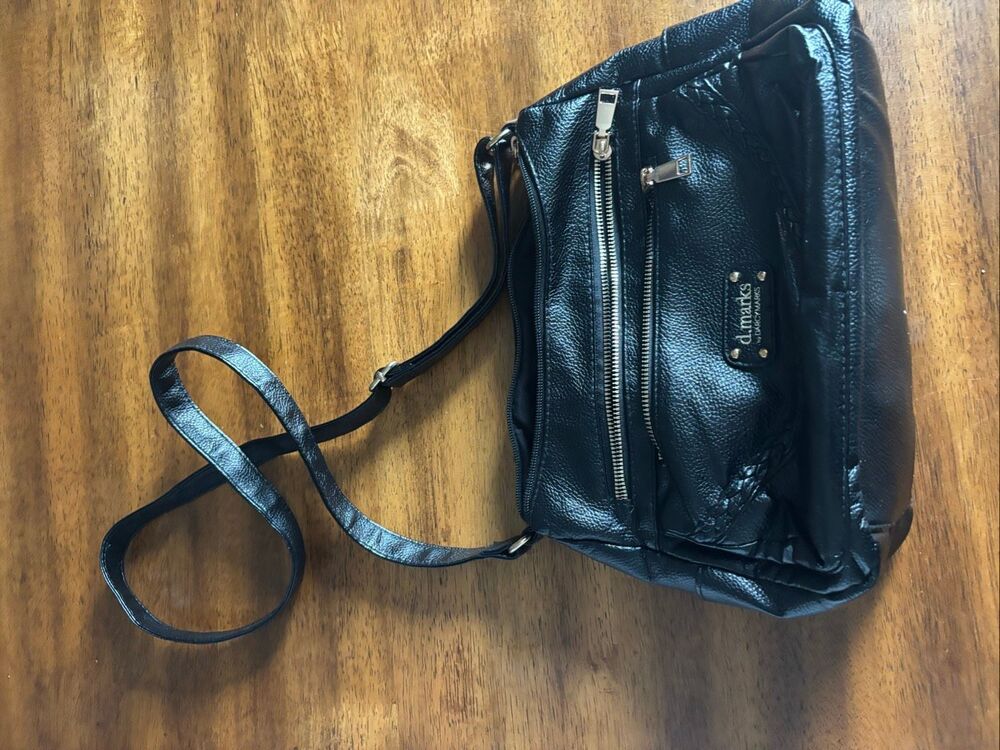 D. Marks women’s purse